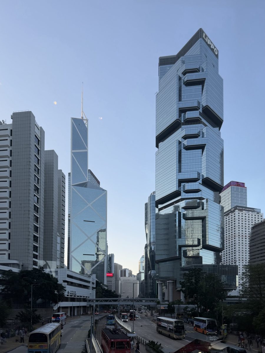 The same Hong Kong skyline after keystone correction, towers standing straight
